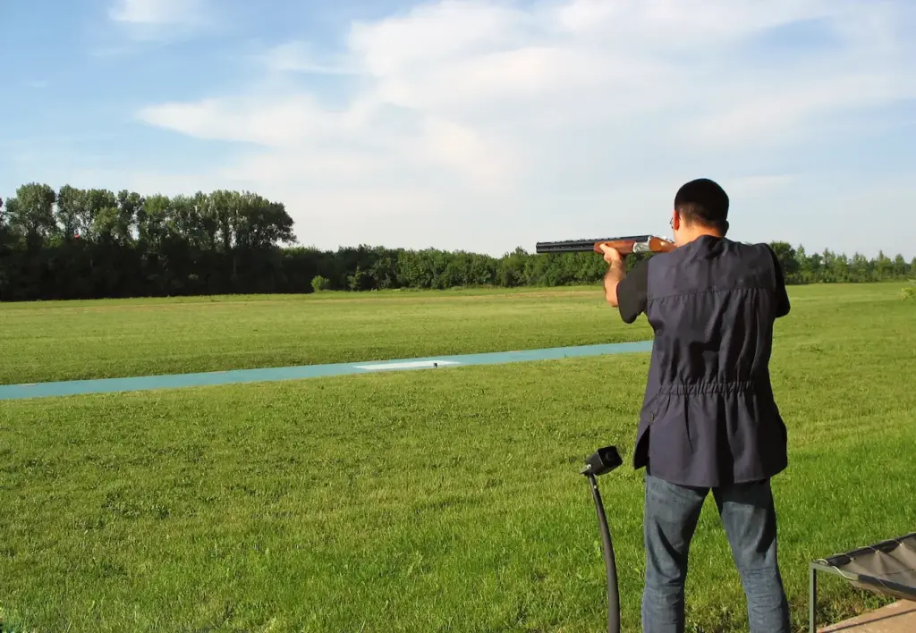 Man Holding a Riffle