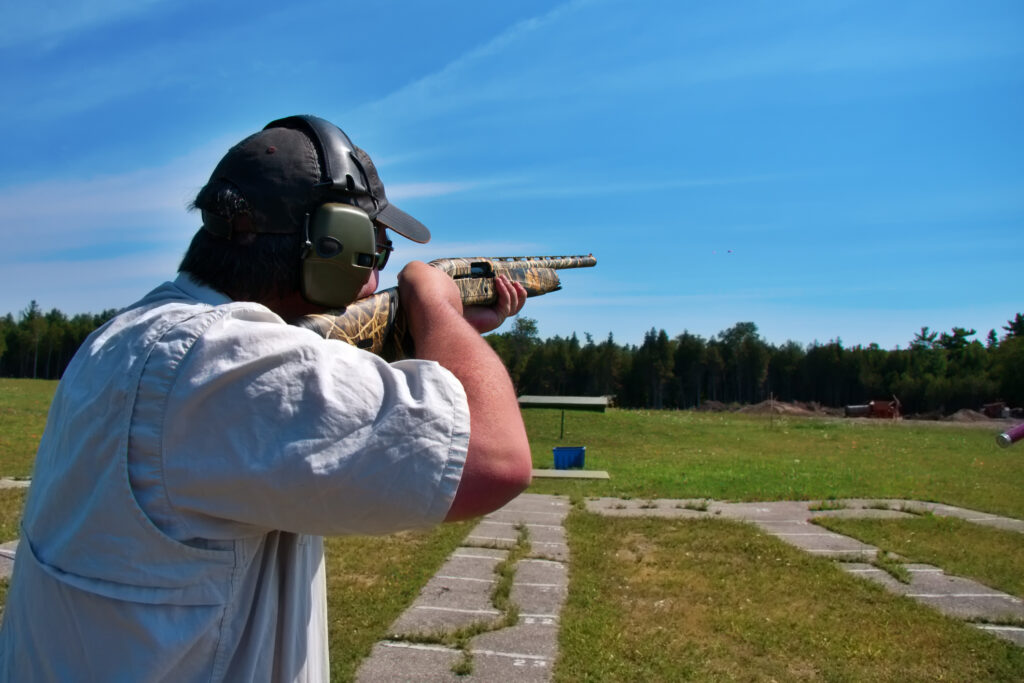 Man Shooting Skeet with Shotgun